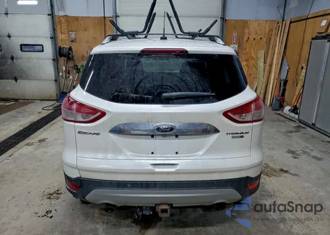 2015 Ford Escape Titanium z USA, uszkodzony, nr VIN 1FMCU9J9XFUC78033